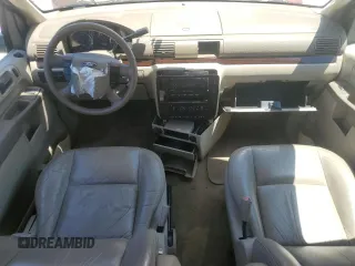 2007 Ford Freestar SEL z VIN 2FMZA52267BA07183, wystawiony jako Copart lot #54223275 z przebiegiem 131 251 mil mil oraz Szkoda całkowita • Salvage title. Historia ofert i sprzedaży dostępna na DreamBid. Obrazek 8.
