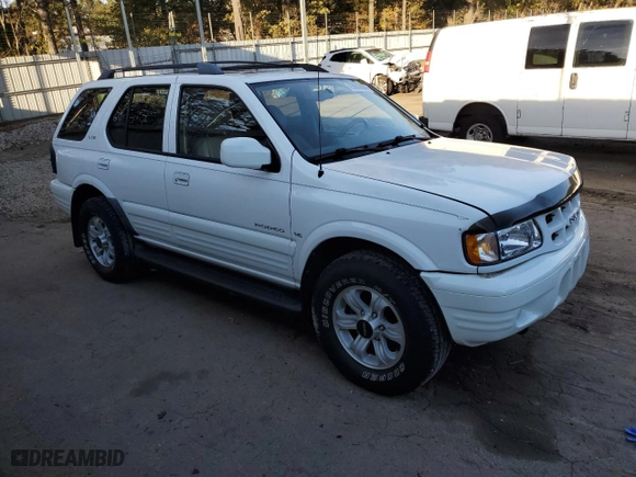 2000 Isuzu Rodeo S with VIN 4S2CK58W8Y4340907, listed as a Copart auction lot 79683804 with 153,419 mi miles and Salvage Title. Bid and sale history available at carsss.com. Image 4.