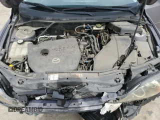 2007 Mazda 3 S Touring z VIN JM1BK344571662713, wystawiony jako Copart lot #59407825 z przebiegiem 107 723 mil mil oraz Szkoda całkowita • Salvage title. Historia ofert i sprzedaży dostępna na DreamBid. Obrazek 11.