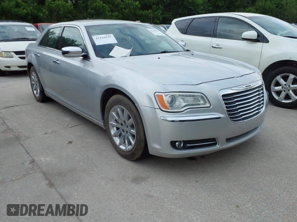 2012 Chrysler 300 Limited with VIN 2C3CCACG9CH223032, listed as a IAAI auction lot 42144147 with 139,625 mi miles. Bid and sale history available at carsss.com. Image 1.
