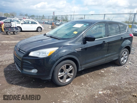 2013 Ford Escape SE with VIN 1FMCU0GX1DUA99040, listed as a IAAI auction lot 42084787 with 140,473 mi miles and . Bid and sale history available at DreamBid. Image 2.