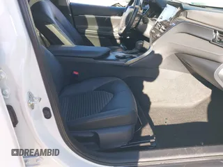 2023 Toyota Camry SE with VIN 4T1T11AKXPU167223, listed as a IAAI auction lot 41667076 with 31,658 mi miles and . Bid and sale history available at DreamBid. Image 5.