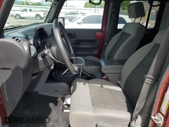 2010 Jeep Wrangler Unlimited Rubicon with VIN 1J4BA6H14AL115460, listed as a Copart auction lot 58349925 with Not provided miles and Salvage title. Bid and sale history available at DreamBid. Image 7.