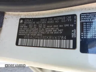 1999 BMW 5 Series 528iAt with VIN WBADP6330XBV61784, listed as a Copart auction lot 77685734 with 210,383 mi miles and Salvage Title. Bid and sale history available at carsss.com. Image 12.