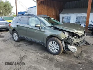 2015 Subaru Outback Premium with VIN 4S4BSBHC0F3311735, listed as a Copart auction lot 57499575 with 133,256 mi miles and Salvage title. Bid and sale history available at DreamBid. Image 4.