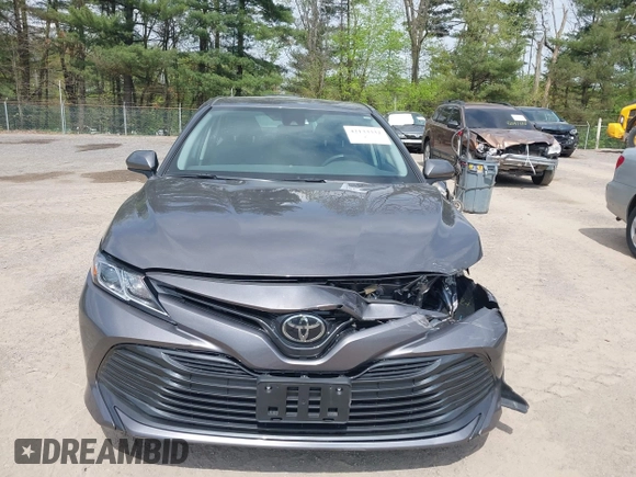 2019 Toyota Camry LE with VIN 4T1B11HK9KU229110, listed as a IAAI auction lot 42133332 with 17,541 mi miles and . Bid and sale history available at DreamBid. Image 13.