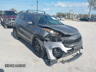 2017 Kia Sportage EX z VIN KNDPN3AC7H7233998, wystawiony jako IAAI lot #41588712 z przebiegiem 137 819 mil mil oraz . Historia ofert i sprzedaży dostępna na DreamBid. Obrazek 6.