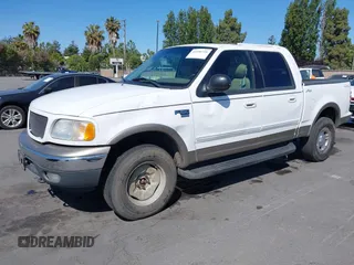 2001 Ford F-150 XLT with VIN 1FTRW08L41KF66947, listed as a IAAI auction lot 42536716 with Not provided miles and . Bid and sale history available at DreamBid. Image 2.