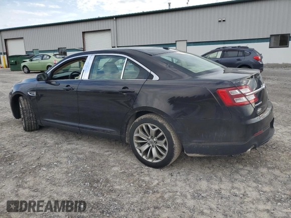 2014 Ford Taurus Limited z VIN 1FAHP2F85EG151167, wystawiony jako Copart lot #54376275 z przebiegiem 136 612 mil mil oraz Szkody całkowita. Historia ofert i sprzedaży dostępna na DreamBid. Obrazek 2.