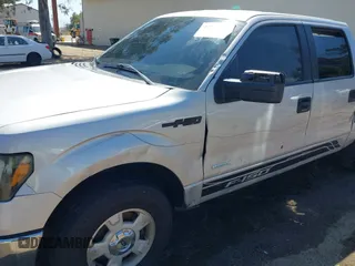 2014 Ford F-150 XL with VIN 1FTFW1CT3EKD12216, listed as a IAAI auction lot 42110775 with 140,673 mi miles. Bid and sale history available at carsss.com. Image 6.