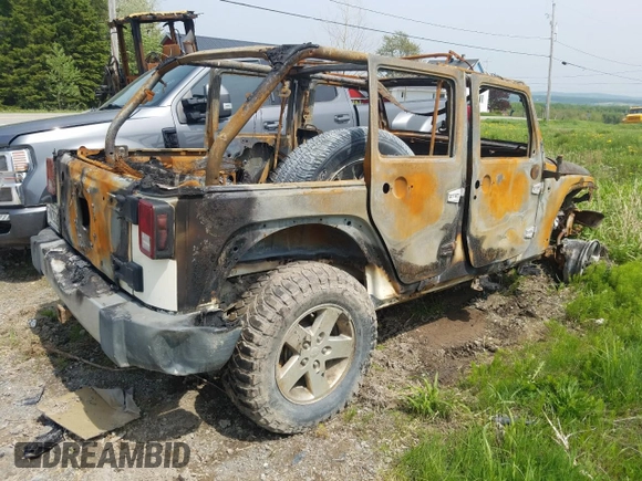 2008 Jeep Wrangler Unlimited X с VIN 1J4GA39128L608115, выставлен на аукционе Copart как лот 58653595 с пробегом Не указан миль и На запчасти • Non repairable. История ставок и продаж доступна на DreamBid. Изображение 3.