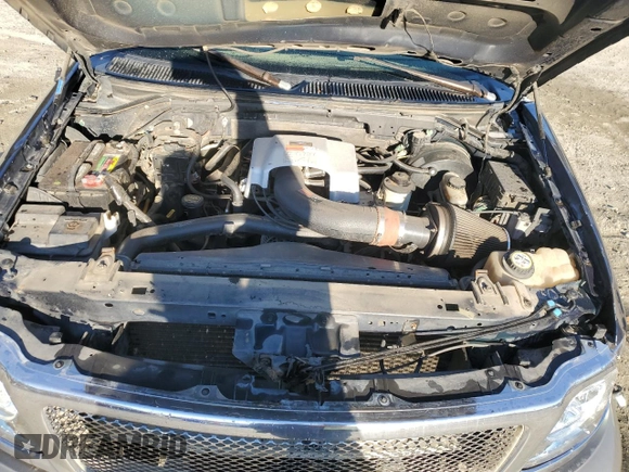 2002 Ford F-150 XL with VIN 1FTRX17L72NA39909, listed as a Copart auction lot 76376994 with 175,926 mi miles and Salvage title. Bid and sale history available at DreamBid. Image 11.