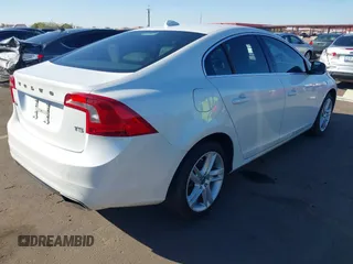 2015 Volvo S60 T5 Drive-E Premier z VIN YV140MFB4F2301427, wystawiony jako IAAI lot #41677045 z przebiegiem 103 262 mil mil oraz . Historia ofert i sprzedaży dostępna na DreamBid. Obrazek 4.
