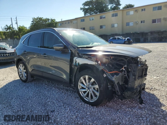 2021 Ford Escape Titanium Hybrid with VIN 1FMCU0DZ2MUB03683, listed as a Copart auction lot 42743175 with 49,095 mi miles and Salvage title. Bid and sale history available at DreamBid. Image 4.