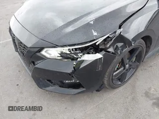 2022 Nissan Sentra SR z VIN 3N1AB8DV1NY231461, wystawiony jako IAAI lot #41842739 z przebiegiem 58 709 mil mil oraz . Historia ofert i sprzedaży dostępna na DreamBid. Obrazek 6.