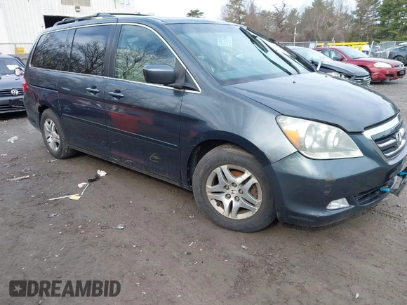 2005 Honda Odyssey EX-L with VIN 5FNRL38645B008281, listed as a IAAI auction lot 41985052 with 219,693 mi miles. Bid and sale history available at carsss.com. Image 1.