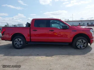 2024 Ford F-150 Lightning XLT with VIN 1FTVW3LK1RWG06162, listed as a IAAI auction lot 41930377 with 0 mi miles. Bid and sale history available at carsss.com. Image 13.