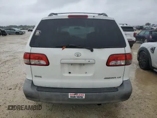 2001 Toyota Sienna LE with VIN 4T3ZF13C21U369506, listed as a Copart auction lot 74561634 with 0 mi miles and Salvage Title. Bid and sale history available at carsss.com. Image 6.