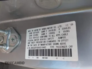 2010 Acura TSX with VIN JH4CU2F60AC019462, listed as a IAAI auction lot 42109261 with 112,131 mi miles. Bid and sale history available at carsss.com. Image 9.