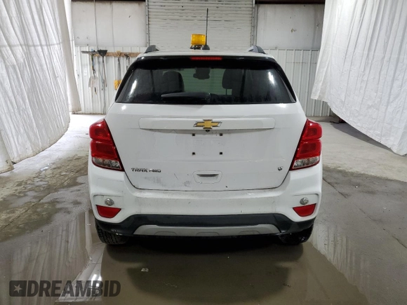 2018 Chevrolet Trax LT with VIN 3GNCJPSB5JL335123, listed as a Copart auction lot 52340495 with 107,257 mi miles and Salvage Title. Bid and sale history available at DreamBid. Image 6.