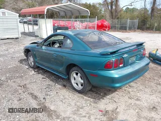 1996 Ford Mustang with VIN 1FALP4041TF145381, listed as a IAAI auction lot 41754114 with 185,072 mi miles. Bid and sale history available at carsss.com. Image 3.