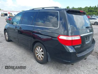 2007 Honda Odyssey Touring z VIN 5FNRL38827B059573, wystawiony jako IAAI lot #42261125 z przebiegiem 214 954 mil mil oraz . Historia ofert i sprzedaży dostępna na DreamBid. Obrazek 3.
