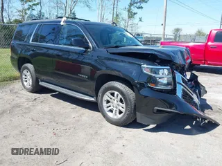 2020 Chevrolet Tahoe LT with VIN 1GNSKBKC3LR176828, listed as a IAAI auction lot 41781047 with 62,840 mi miles and . Bid and sale history available at DreamBid. Image 1.