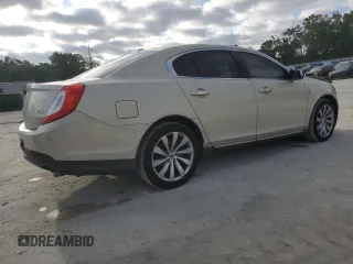 2014 Lincoln MKS with VIN 1LNHL9DKXEG612758, listed as a Copart auction lot 53230065 with 98,863 mi miles and Salvage Title. Bid and sale history available at carsss.com. Image 3.