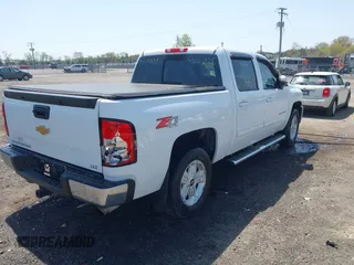 2013 Chevrolet Silverado 1500 LTZ with VIN 3GCPKTE24DG123063, listed as a IAAI auction lot 42061675 with 221,813 mi miles and . Bid and sale history available at DreamBid. Image 4.
