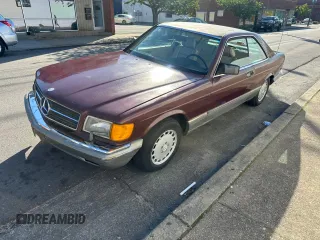 1986 Mercedes-Benz 560 with VIN WDBCA45D2GA206016, listed as a Copart auction lot 54577205 with 205,332 mi miles and Clean Title. Bid and sale history available at DreamBid. Image 2.