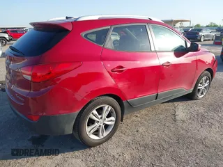 2013 Hyundai Tucson GLS with VIN KM8JU3AC6DU763590, listed as a IAAI auction lot 41999555 with 149,960 mi miles. Bid and sale history available at carsss.com. Image 4.