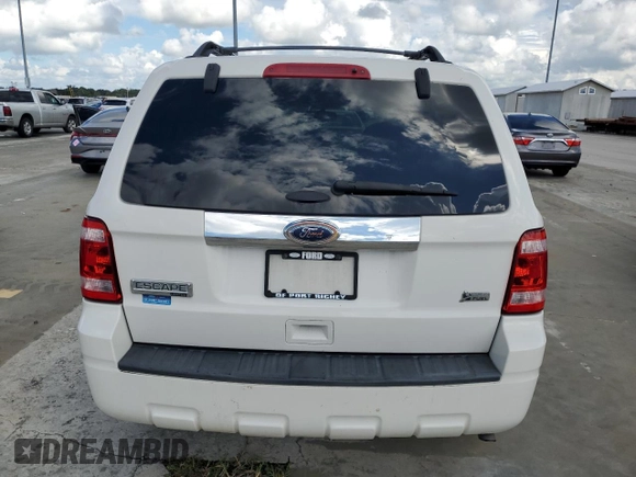 2012 Ford Escape Limited with VIN 1FMCU0EG3CKB49563, listed as a Copart auction lot 74003184 with 115,060 mi miles and Salvage Title. Bid and sale history available at carsss.com. Image 6.