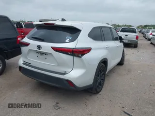 2023 Toyota Highlander L with VIN 5TDKDRAH9PS039652, listed as a IAAI auction lot 41948320 with 127,310 mi miles and . Bid and sale history available at DreamBid. Image 4.