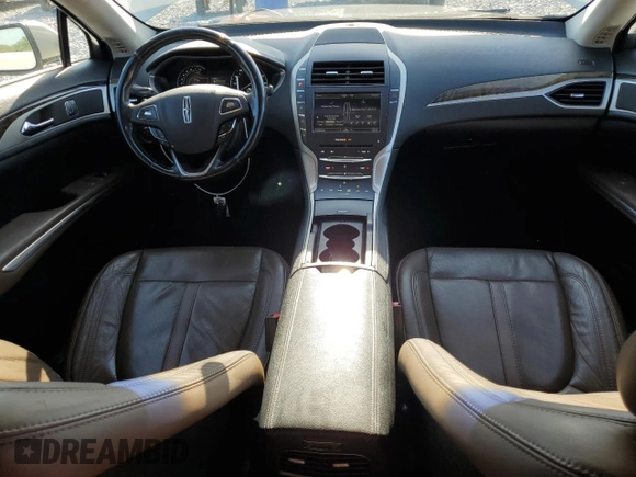 2016 Lincoln MKZ z VIN 3LN6L2G93GR615052, wystawiony jako Copart lot #54717335 z przebiegiem 86 575 mil mil oraz Szkoda całkowita • Salvage title. Historia ofert i sprzedaży dostępna na DreamBid. Obrazek 8.