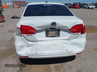 2013 Volkswagen Jetta SE z VIN 3VWDX7AJ4DM424276, wystawiony jako IAAI lot #41878223 z przebiegiem 152 789 mil mil oraz . Historia ofert i sprzedaży dostępna na DreamBid. Obrazek 13.