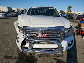 2018 GMC Canyon 4WD SLT z VIN 1GTG6DEN3J1143092, wystawiony jako Copart lot #46322305 z przebiegiem 64 599 mil mil oraz Szkoda całkowita • Salvage title. Historia ofert i sprzedaży dostępna na DreamBid. Obrazek 5.