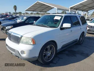 2004 Lincoln Navigator Luxury with VIN 5LMFU27R04LJ43817, listed as a IAAI auction lot 40891013 with 166,620 mi miles. Bid and sale history available at carsss.com. Image 17.