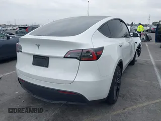 2024 Tesla Model Y with VIN 7SAYGDED6RF166543, listed as a IAAI auction lot 41713362 with Not Provided miles and . Bid and sale history available at DreamBid. Image 4.