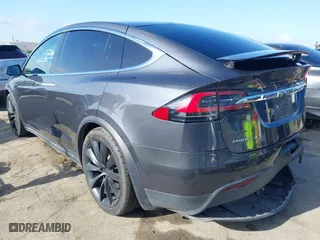 2018 Tesla Model X 75D with VIN 5YJXCBE22JF124270, listed as a IAAI auction lot 41909734 with 92,553 mi miles. Bid and sale history available at carsss.com. Image 3.