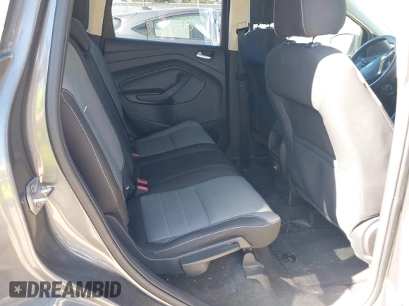 2014 Ford Escape SE with VIN 1FMCU9G99EUB13371, listed as a IAAI auction lot 42167417 with 140,145 mi miles and . Bid and sale history available at DreamBid. Image 8.