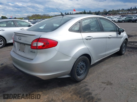 2011 Ford Fiesta SE with VIN 3FADP4BJ8BM216789, listed as a IAAI auction lot 41843080 with 95,424 mi miles. Bid and sale history available at carsss.com. Image 4.