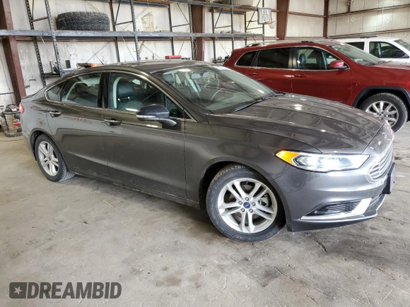 2018 Ford Fusion SE с VIN 3FA6P0HD2JR175712, выставлен на аукционе Copart как лот 55277275 с пробегом 66 643 миль миль и Списание • Salvage title. История ставок и продаж доступна на DreamBid. Изображение 4.