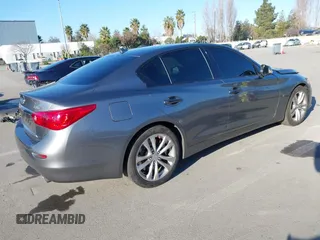 2015 Infiniti Q50 Premium with VIN JN1BV7APXFM333101, listed as a IAAI auction lot 41667109 with 112,477 mi miles and . Bid and sale history available at DreamBid. Image 4.