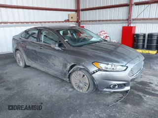 2013 Ford Fusion Titanium Hybrid with VIN 3FA6P0RU0DR277092, listed as a IAAI auction lot 41811079 with 123,071 mi miles. Bid and sale history available at carsss.com. Image 1.