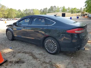 2017 Ford Fusion SE z VIN 3FA6P0H98HR328552, wystawiony jako Copart lot #52709395 z przebiegiem 188 451 mil mil oraz Szkoda całkowita • Salvage title. Historia ofert i sprzedaży dostępna na DreamBid. Obrazek 2.