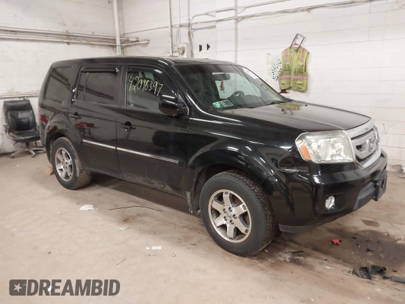 2009 Honda Pilot Touring with VIN 5FNYF48939B041166, listed as a IAAI auction lot 42098397 with 228,305 mi miles and . Bid and sale history available at carsss.com. Image 1.