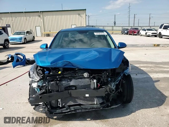 2023 Kia Rio LX z VIN 3KPA24AD2PE597810, wystawiony jako Copart lot #53565235 z przebiegiem 6 836 mil mil oraz Szkoda całkowita • Salvage title. Historia ofert i sprzedaży dostępna na DreamBid. Obrazek 14.