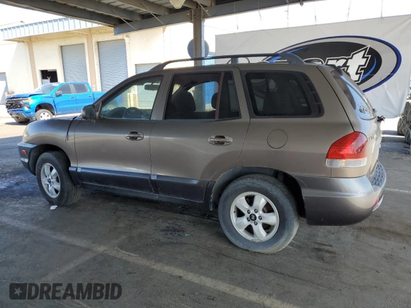 2005 Hyundai Santa Fe GLS with VIN KM8SC13D75U912706, listed as a Copart auction lot 57878555 with 134,565 mi miles and Clean title. Bid and sale history available at DreamBid. Image 2.