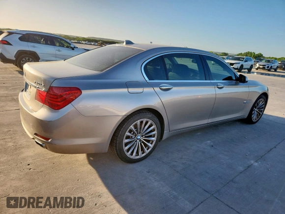 2012 BMW 7 Series 740Li with VIN WBAKB4C59CC576610, listed as a Copart auction lot 62762465 with 128,073 mi miles and Clean title. Bid and sale history available at DreamBid. Image 3.