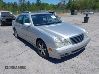 2002 Mercedes-Benz E-Class with VIN WDBJF65J72B441380, listed as a IAAI auction lot 42040268 with 210,471 mi miles. Bid and sale history available at carsss.com. Image 1.